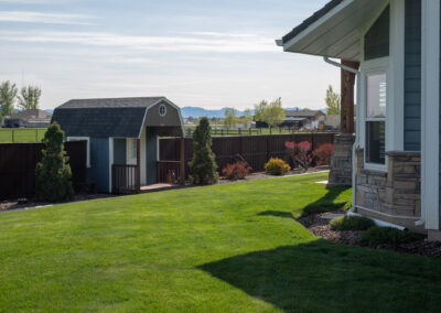 Barn style storage shed with porch