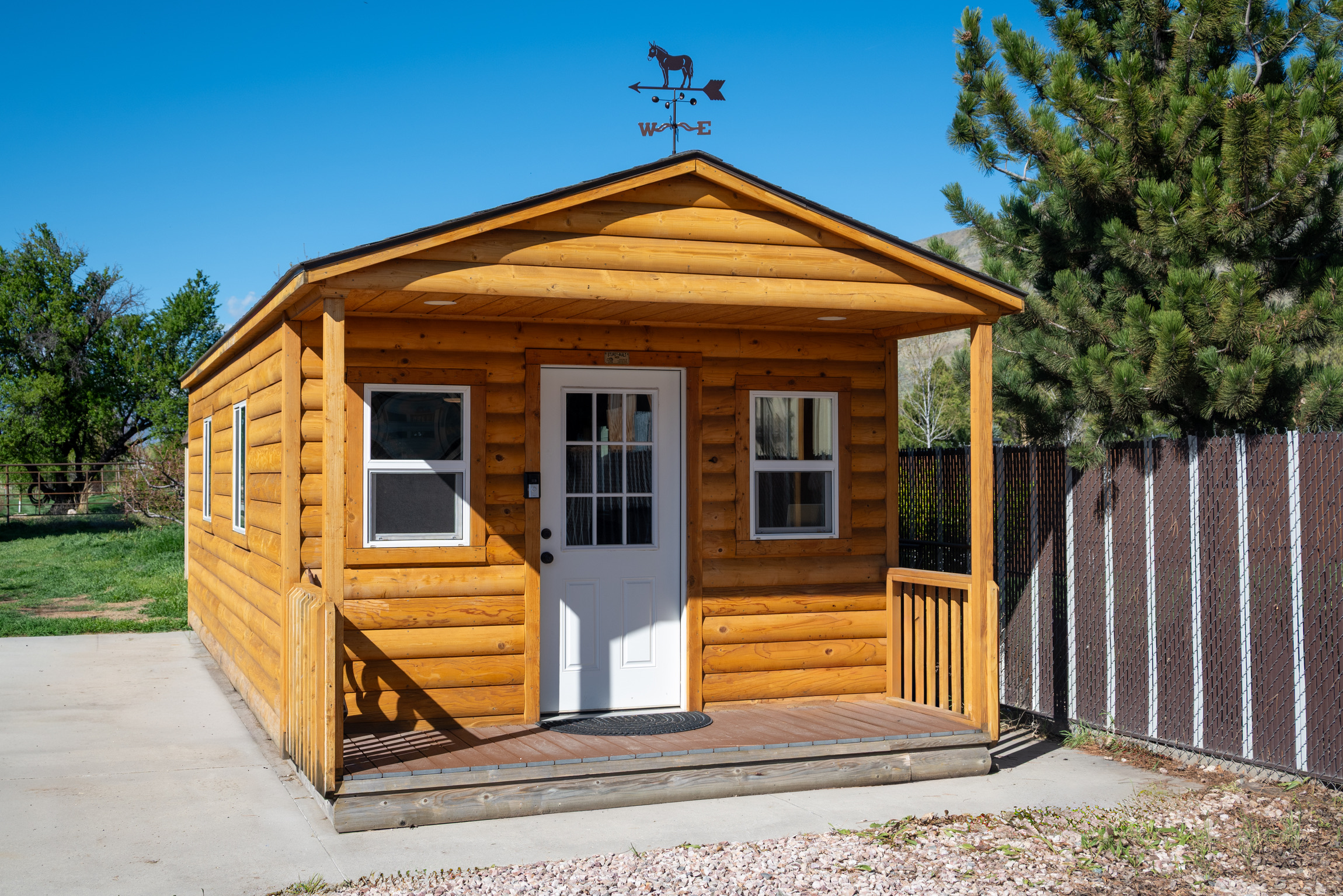 A-frame log cabin style shed