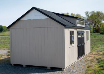 Tan A-Frame Shed with Black Roof