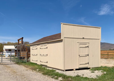 Beige A Frame custom build with a facade for the roof