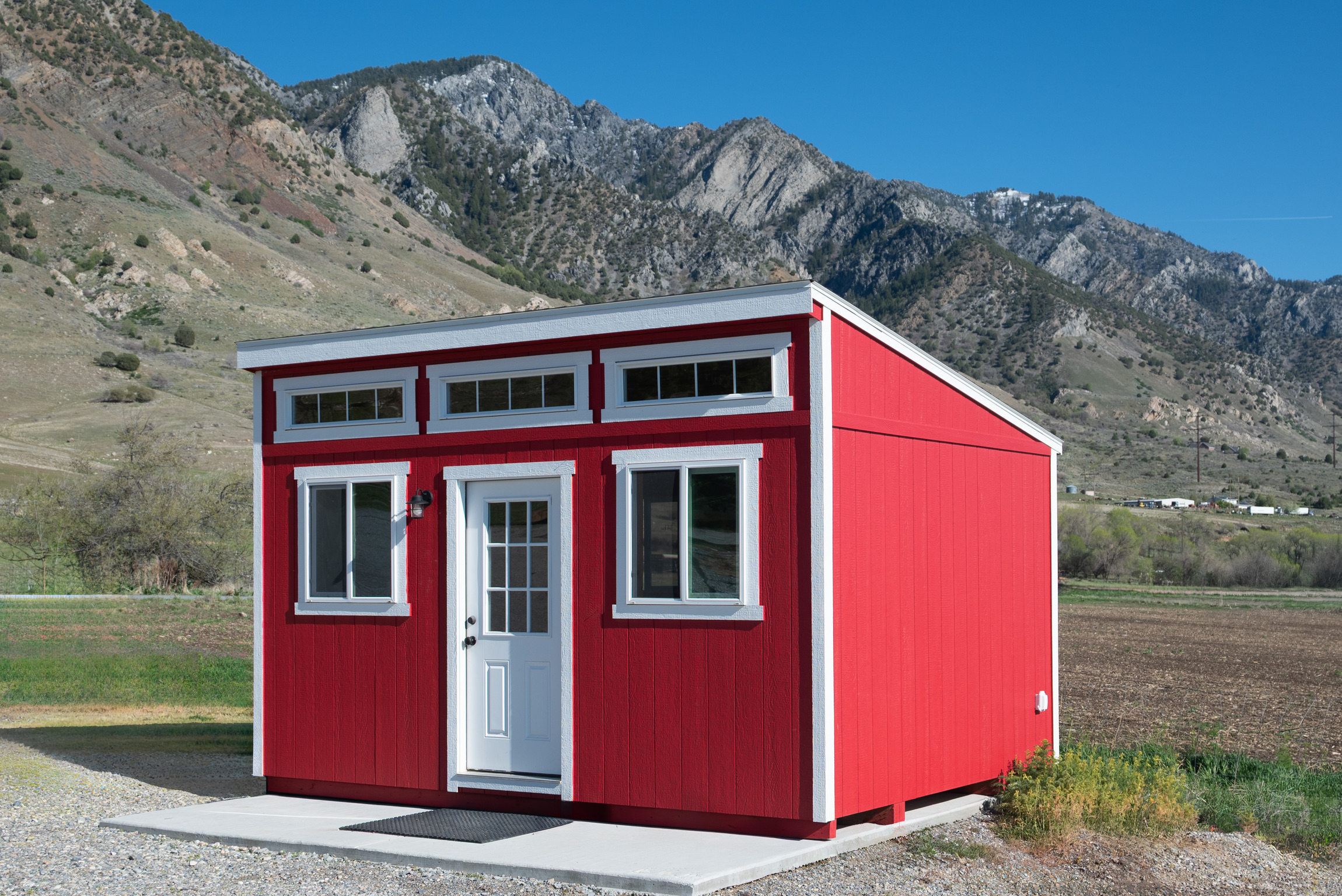 A-frame log cabin style shed